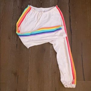 White sweatpants with rainbow lining on the sides